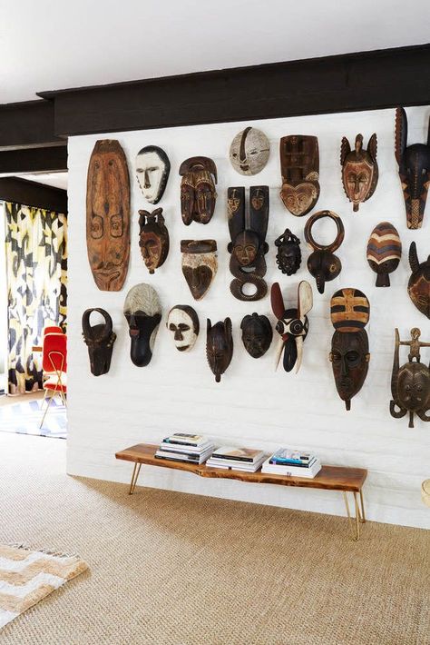 Must Have African inspired Decor | African Mask accent wall African Decor Living Room, African Bedroom, African Interior Design, African Inspired Decor, Parker Palm Springs, African Interior, Afrikaanse Kunst, African Home Decor, African Decor