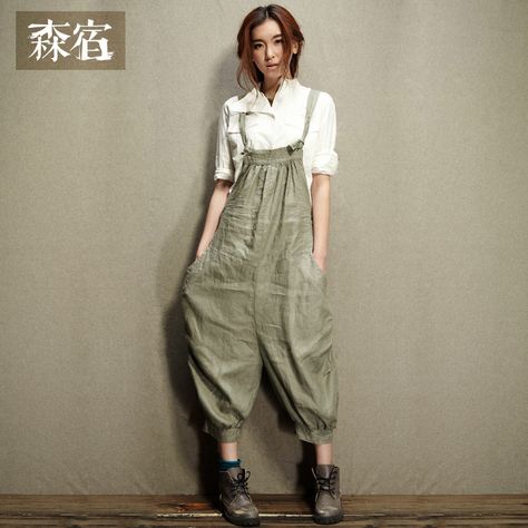 1940's Newsboy-Inspired Linen Overalls with exaggerated, suspender-style back. Slight bib in front; adjustable straps that tie to bib in front. Side pockets. MEDIUM: Linen (Flax) / Label: Sam's Tree / Mori places... Spring 2013 Collection Industrial Fashion, Jumpsuit Linen, Farmer Outfit, Neo Grunge, Cute Jumpsuit, Linen Overalls, Mori Fashion, Women Jumpsuit, Womens Jumpsuits