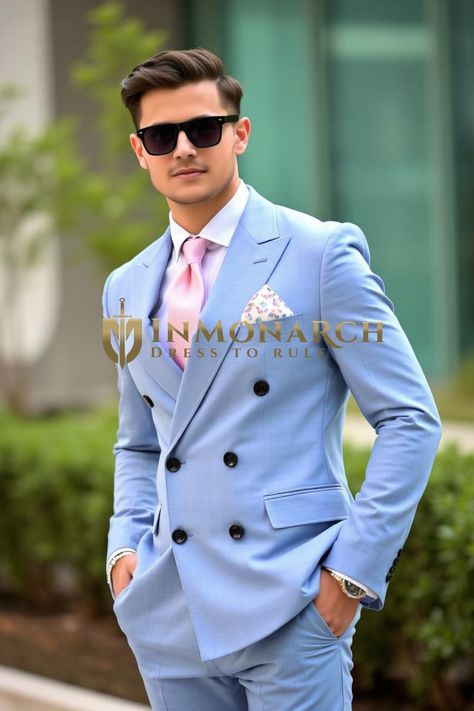 A light sky blue three-piece suit with black buttons, paired with a white dress shirt, light pink tie, and patterned pocket square. Includes jacket and pants; accessories are extra. Crafted from luxurious polyester blend fabric for comfort and style. Ideal for weddings, graduations, and special events. Dry clean only. Made in India. Blue Three Piece Suit, Mens Dress Vests, Mens Tunic, Blazer Wedding, Pocket Square Pattern, Light Blue Suit, Pants Accessories, Safari Shirt, Linen Tunic Dress