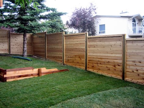 Modern Style Cedar Fencing - Morgan K Landscapes Fence On Sloped Yard, Arbour Garden Ideas, Fence On Slope, Wooden Panel Design, Modern Wood Fence, Cedar Fencing, Wood Fence Gates, Yard Remodel, Diy Privacy Fence