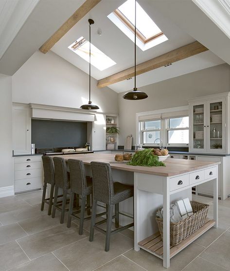 A tumbled finish would typically be used in country interiors, but the soft, cloudy colouring of this limestone with its inky highlights makes it just right for more urban, contemporary interiors. The surface is almost powdery to look at. Grey Island, Limestone Floor, Wooden Island, Shaker Kitchens, Kitchen Diner Extension, Island Stools, Modern Townhouse, Spacious Kitchen, Rear Extension