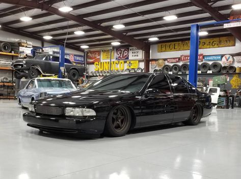 The seventh generation Impala was launched in 1994 in SS trim, which meant power from a 260 horsepower LT1 borrowed from the Corvette. Unfortunately the Impala SS didn’t come with a manual gearbox and was only available with GM’s 4-speed 4L60E slushbox, but this next car has a T-56 manual 6-speed gearbox and is slammed to the ground with an air ride suspension. If it isn't stock...it might as well be wild. #Murica #6speed #Chevrolet #Impala #ImpalaSS #SS Impala Ss 1996, 1996 Impala Ss, Chevy Impala Ss, Seventh Generation, Impala Ss, Vintage Classics, Air Ride, Chevy Impala, Chevrolet Impala