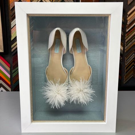 👰‍♀️ Wedding shoes custom framed with metallic textured matting, UV glass, fillet and shadowbox frame! #art #denver #colorado #pictureframing #customframing #5280customframing #wedding #bride #shadowbox Wedding Dress Frame, Arts Exhibition, Wedding Shadow Box, Picture Framing, Shoes Custom, Wedding Bows, Wedding Heels, Frame Art, Wedding Frames