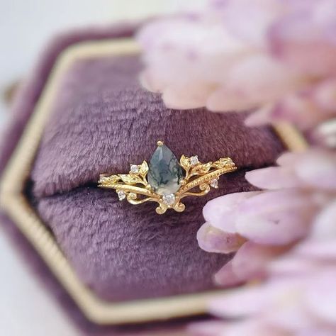 Azura Jewelry New York on Instagram: "Let the beauty of nature speaks to us through our Lotus Moss Agate Ring.🍃 A captivating aura we simply can't just resist. Tag a nature lover friend who will fancy this unique gemstone jewelry. 💫" Fairy Engagement Ring Gold, Moss Agate Engagement Ring Gold, Elven Wedding Ring, Whimsical Rings, Whimsical Wedding Ring, Whimsical Engagement Ring, Fairytale Engagement Rings, Elven Ring, Agate Wedding Ring