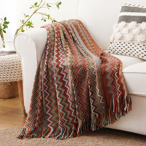 PRICES MAY VARY. PREMIUM FABRIC & SIZE: Made of 100% high quality skin-friendly acrylic,Ultra comfy soft touch.Our boho throw blanket is lightweight cozy and warm,easy to store and carry without taking up space. Measures 50" x 60", decorative blankets for all season. UNIQUE DESIGN: Retro Bohemian color with nice tassels. Skilfully crafted design with geometric pattern. Two sizes available and colorful design.Our knitted throw blankets are durable and versatile. Perfect for a beautiful home decor Tassel Blankets, Boho Throw Blanket, Red Throw Blanket, Boho Blanket, Red Throw, Boho Throws, Sofa Throw Blanket, Striped Blankets, Woven Throw Blanket