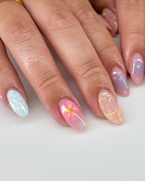 summer freestyle for maddie 🌺🫧🐚 i’m actually so in love with how this set turned out omg and it was so fun to make the water nail likeeee look how realistic?? love. #nails #nailart #summernails #summer #gelx #gel #gelnails #vbeautypure #apresgelx #après #vbp #nailinspo #nailinspiration #gelextensions #almondnails Bali Nails, Hoco Nails, Cruise Nails, August Nails, Water Nails, Cute Nail Art Designs, Edgy Nails, Summery Nails, Cute Gel Nails