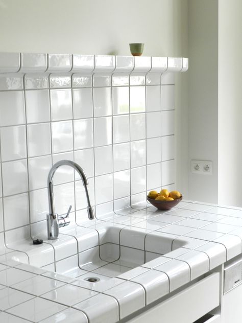 D-tile is a system which allows any space or object to be completely covered with tiles. This is possible because the D-tile collection consists of flat-, construction-, and function-tiles. The quality of all D-tile products, frost resistant stoneware, ensures that it is applicable everywhere and under all circumstances. And where... White Tiles, Kitchen Tiles, Cheap Home Decor, 인테리어 디자인, A Kitchen, Bathroom Interior, Kitchen Inspirations, Kitchen Interior, Kitchen Dining Room