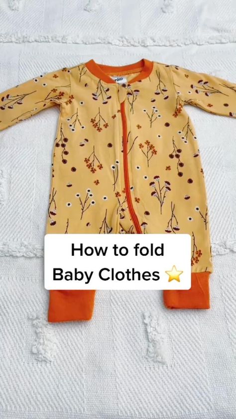 Folding A Onesie, How To Fold Footed Pajamas, Onesie Folding Hack, How To Fold Baby Sleepers, Folding Newborn Clothes, How To Fold Newborn Clothes, Folding Baby Clothes Organizing, How To Store Baby Clothes, How To Fold Baby Onesies