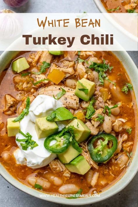 Healthy, hearty, and full of flavor, this White Bean Turkey Chili is just what you need on a cold winter day. Freezer friendly, meal prep friendly, and most importantly, kid-friendly! #turkeychili #chilirecipe #whitebeanchili #chili via @healthyfitnessmeals Ground Turkey White Bean Chili, White Bean Pumpkin Turkey Chili, Low Cal Turkey Chili, Beanless Turkey Chili, Clean Eating Turkey Chili, Ground Turkey Slow Cooker, White Turkey Chili, White Bean Turkey Chili, Classic Chili Recipe