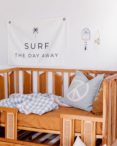 How incredible is this nursery featuring my Surf The Day Away wall flag!! This coastal boho kids room is so beautiful, styled by The Content Co. and Bubbles Lane! Love the rattan cot by Sacred Bundle 🤩🌴 Coastal Boho Nursery, Sacred Bundle, Wall Flags, Boho Kids Room, Wall Flag, Coastal Boho, Boho Kids, Gender Neutral Nursery, Boho Nursery