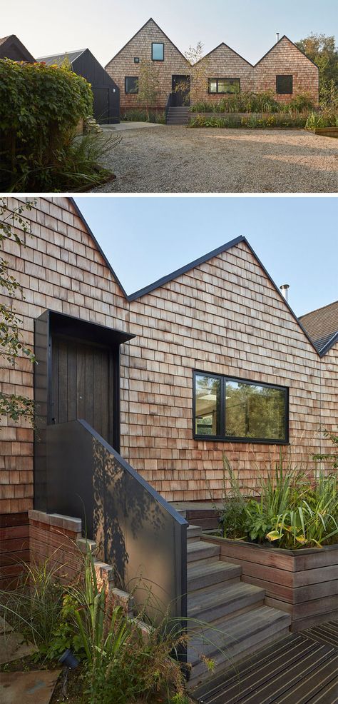 This house for a family was built next to a secluded lagoon in England Alan Williams, New Modern House, Shingle House, Clad Home, Wood Shingles, Wood Architecture, Cedar Shingles, Built In Bench, Eco House