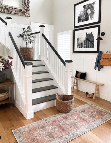 Black and White Stairs: Ideas and Inspiration | Hunker Black And White Staircase, Black And White Stairs, White Staircase, White Stairs, Staircase Ideas, Staircase Remodel, Staircase Makeover, Modern Farmhouse Home, Painted Stairs