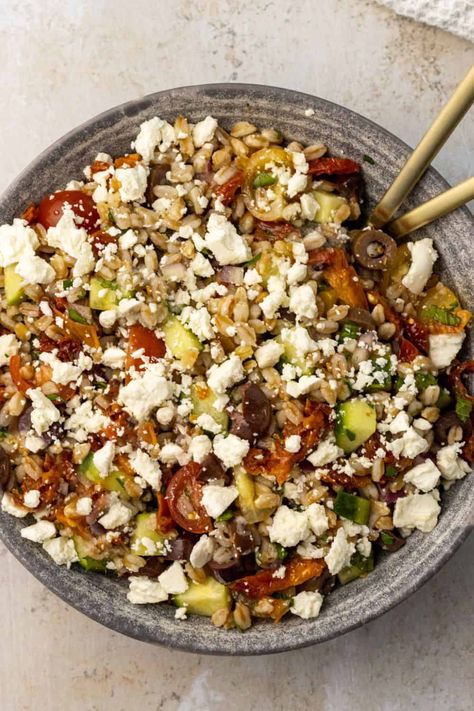 This easy flavor-packed Mediterranean Farro Salad has tender chewy farro tossed with veggies and herbs in a tangy dressing and then topped with creamy salty feta. Red Wine Vinegar Dressing, Farro Salad Recipes, Soba Noodles Salad, Creamy Feta, Salad With Feta, Farro Salad, Vinegar Dressing, Small Tomatoes, Homemade Salads