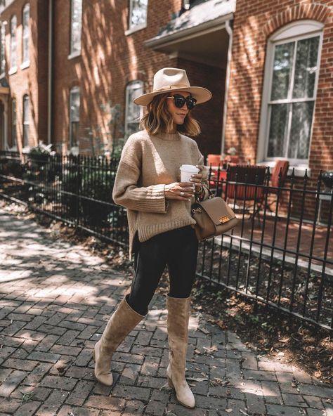 Karina Style Diaries wearing spanx faux leather leggings tan oversized sweater tall suede tan boots lack of color hat Tan Boots Outfit, Leather Leggings Casual, Business Chic Outfits, Suede Boots Outfit, Tall Boots Outfit, Leather Leggings Look, Karina Style, Leather Leggings Outfit, 2024 Outfits