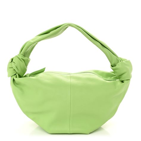 This is an authentic BOTTEGA VENETA Calfskin Mini Double Knot Bag in Pistachio. This is a beautiful hobo, crafted of calfskin leather in light green. This bag features a leather top handle with knotted ends, silver top zipper opens to an interior of matching green leather. Knot Bag, Double Knot, Silver Top, Silver Tops, Green Leather, Leather Top, Pistachio, Bottega Veneta, Top Handle