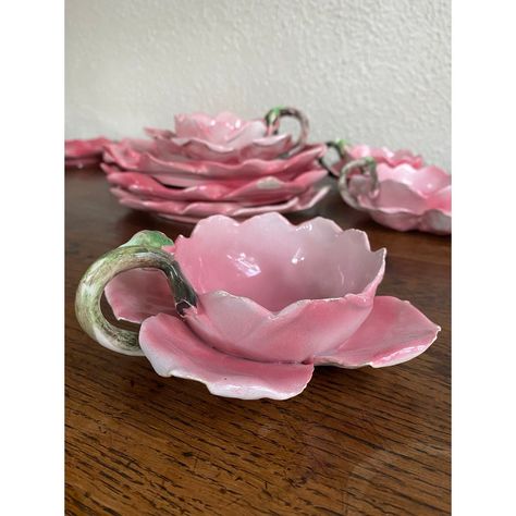 Set of Italian hand painted, handmade rose bud dessert/tea set. The teacups have curled petals with rosebud stem handles. Variations of color from deep rose to the softest pale pink showcase the hand painting. They are so lifelike and delicate! Incredible detail.   There is some chipping to some of the petals on the cups and two plates have hairline cracks. See photos.   There are 9 plates and 10 cups.   These would make an adorable spring table. Also imagine as precious for a child’s birthday d Vintage Pink Plates, Kawaii Tea Set, Flower Tea Set, Pink Stuff To Buy, Ceramic Sketchbook, Teacup Bouquet, Aesthetic Plates, Spring Ceramics, Ceramics Aesthetic