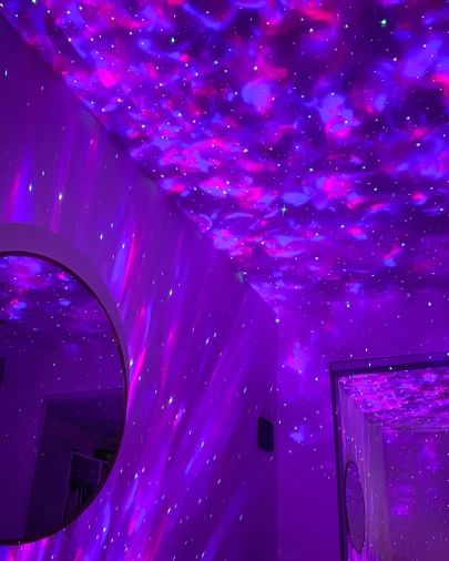 OBSESSED with my galaxy light projector from Amazon, and it’s on sale! http://liketk.it/35odx #liketkit @liketoknow.it #LTKsalealert #LTKhome Galaxy Light Projector, Aurora Projector, Projector In Bedroom, Deco Violet, Galaxy Bedroom, Galaxy Room, Purple Led Lights, Purple Room Decor, Galaxy Light