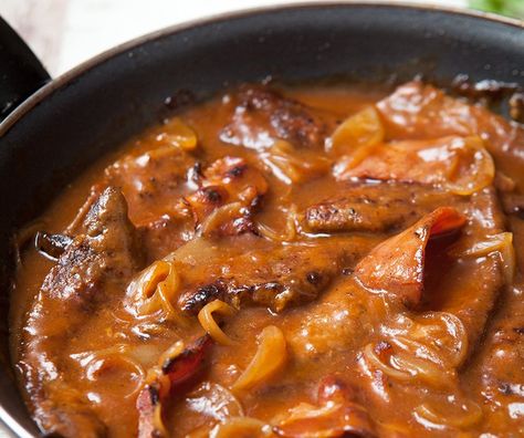 Liver and bacon with onion gravy. This recipe calls for using ketchup in the sauce, which I will not use, subbing for the same amount of tomato paste instead. If you caramelize the tomato paste until it turns a darker red, it gives the sauce a taste of something that has cooked for a longer period of time. I also will add a splash of red or white wine to the sauce, right after I caramelize the tomato paste. Liver And Bacon, Offal Recipes, Liver And Onions, Liver Recipes, Onion Sauce, Chicken Liver, Onion Gravy, Beef Liver, Gravy Recipe