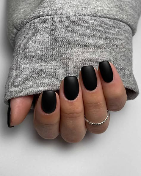 Looking for chic black nails inspiration? You’ll love this list of stunning black nail designs in all different shapes including short, square, coffin, almond, stiletto and more. There’s simple black nails ideas or more intricate acrylic designs with glitter, trendy art, and more. Nude And Black Nail Designs, Nails For College, Black Nails Short, Classy Black Nails, Black Gel Nails, Black Coffin Nails, Matte Black Nails, Black Acrylic Nails, Black Nail Art