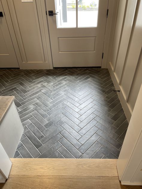 Chevron Tile Entryway, Herringbone Tile Entry, Entryway Herringbone Tile, Tile Floors For Mudroom, Front Entry Flooring Ideas, Small Entry Tile Floor Entryway, Stone Flooring Entryway, Herringbone Tile Front Entrance, Entry Flooring Ideas Entryway