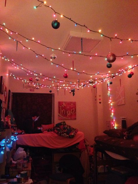 Colorful Christmas Lights In The Bedroom, Dorm Room Holiday Decor, Christmas Decor Ideas Dorm Room, Christmas Lights Room Decor, Room With Christmas Lights, Christmas Lights Room, Dorm Christmas Lights, Christmas Lights On Ceiling, Dorm Christmas Decor