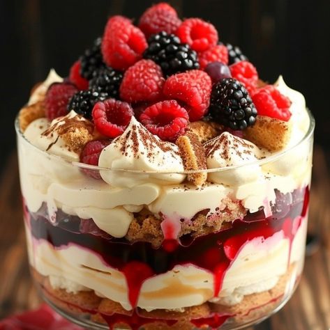 🍓🍰 Dive into layers of bliss with Berry Tiramisu Trifle! Luscious, fruity, and irresistible! #BerryDelicious #TiramisuTrifle Berry Tiramisu Trifle Recipe This trifle combines the classic flavors of tiramisu with the fresh zest of seasonal berries, making it a perfect dessert for any gathering. Ingredients: Mascarpone cheese: 250g Heavy cream: 240ml Powdered sugar: 75g Vanilla extract: 5ml Ladyfingers: 200g Mixed berries (strawberries, blueberries, raspberries): 300g Coffee (cooled): 240ml... Easy Berry Trifle Recipe, Tiramisu Trifle Recipe, Cranberry Trifle, Blueberry Trifle Recipe, Berry Tiramisu, Blueberry Trifle, Trifle Bowl Recipes, Tiramisu Trifle, Raspberry Trifle