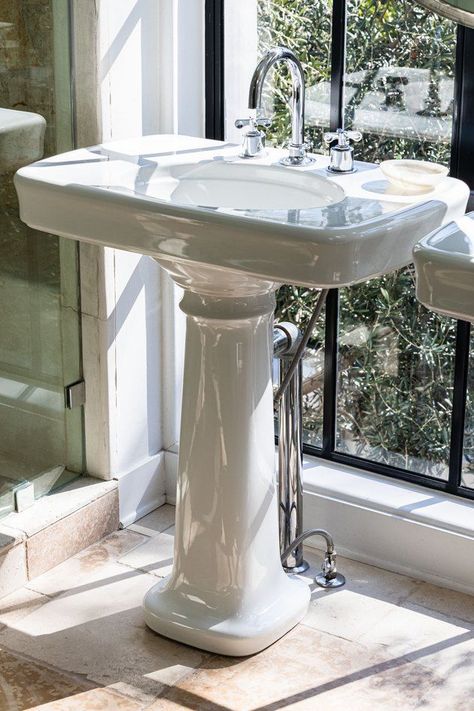 With so many bathroom sink ideas out there, it wouldn't be surprising if you started to feel overwhelmed. That's why we're here with a few basic deets to help you narrow things down, along with these points to consider. #hunkerhome #bathroomsinkideas #bathroomsink #bathrooms #sinkideas Pedestal Sink With Counter Space, Small Bathroom Ideas With Pedestal Sink, Pedastle Sink Bathroom Ideas, Pedastle Sink, Pedistool Sink, Pedestal Sink Bathroom Ideas, Black Pedestal Sink, Pedistal Sink, Pedastal Sink