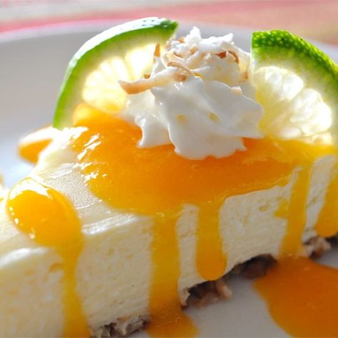 Coconut-Lime Cheesecake with Mango Coulis | "Best cheesecake I EVER made. With the sauce and whipped cream, it looked like an expensive restaurant dessert." Lula Party, Ginger Nut Biscuits, Hawaii Recipes, Coulis Recipe, Mango Coulis, Coconut Crust, Lime Cookies, Key Lime Cheesecake, Citrus Recipes