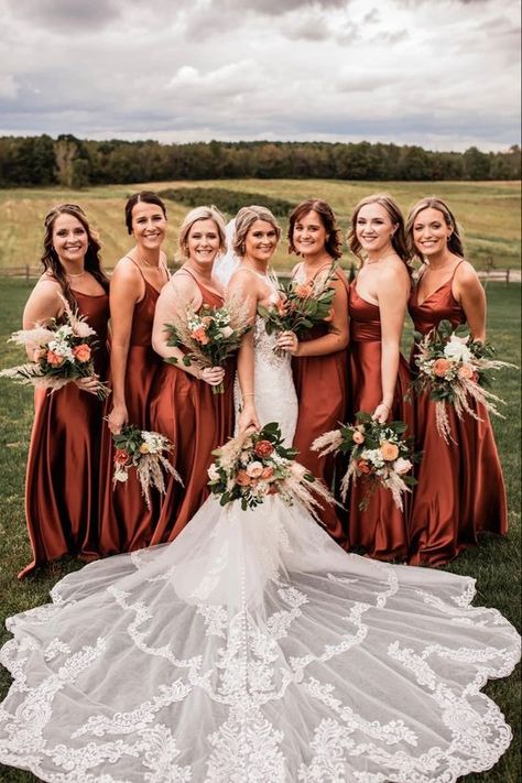 Rust Country Wedding Colors for 2024, Rust Bridesmaid Dresses, Rust Wedding Bouquets - ColorsBridesmaid Fall Boho Wedding Inspiration, Western Style Bridesmaid Dresses, Country Wedding Dress Ideas, Rustic Orange Bridesmaid Dresses, Rust Wedding Bouquets, Rust Wedding Party, Rust Color Wedding, Western Wedding Colors Schemes, Khaki Groom