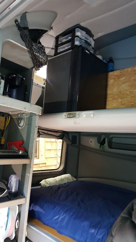 Small fridge on 2nd bunk Trucker Cabin Decor, Semi Truck Top Bunk Storage, Semi Truck Sleepers Interiors, Semi Truck Sleeper Ideas, Truck Sleeper Ideas, Semi Truck Storage Ideas, Semi Truck Organization Ideas, Semi Truck Living, Hotshot Trucking