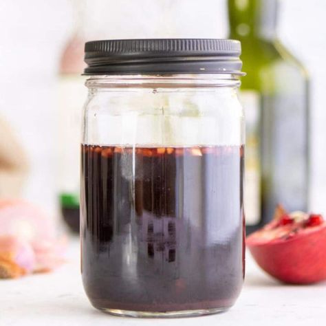 Pomegranate juice is a great way to get pomegranate flavor without having to make a mess. Try this easy pomegranate balsamic vinegar that can be used as a marinade or salad dressing. #quickdinner #saladdressing #recipe #homemadevinegar #cookingforone Marinade For Pork, Witch Recipes, Balsamic Marinade, Pork Marinade, Sauteed Kale, Vinegar Uses, Warm Salad, Single Serving Recipes, Marinated Pork