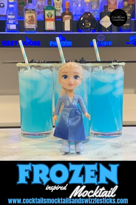 this image shows three tall blue drinks with silver rim, blueberry garnish and blue and white striped straws with glitter scattered around and Disney Frozen's Elsa in front of them. Frozen Snacks Disney, Frozen Brunch Birthday Party, Frozen Movie Night Food, Disney Themed Drinks, Frozen Movie Night, Frozen Themed Food, Disney Nights, Kids Drinks Party, Frozen Birthday Party Food