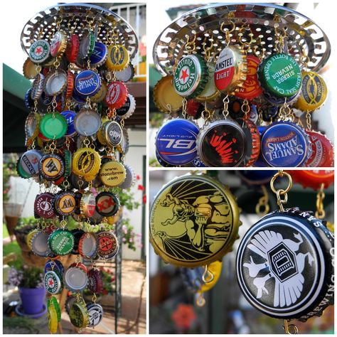 This is a three tiered random beer cap wind chime. The top consist of a vegetable steamer, which the strands of beer caps connect to. There is an eye bolt for hanging at the top of the vegetable steamer. The longest strand consist of 8 random beer caps. The middle strand consist of 6 random beer caps. The outside strand consist of 4 random beer caps.     It does make a light tinkling noise when the wind blows. Just enough for you to hear. Wind Chimes Ideas, Recycle Bottle Caps, Make Wind Chimes, Wind Chimes Homemade, Wine Bottle Wind Chimes, Beer Bottle Caps, Beer Bottle Cap, Bottle Cap Art, Diy Wind Chimes