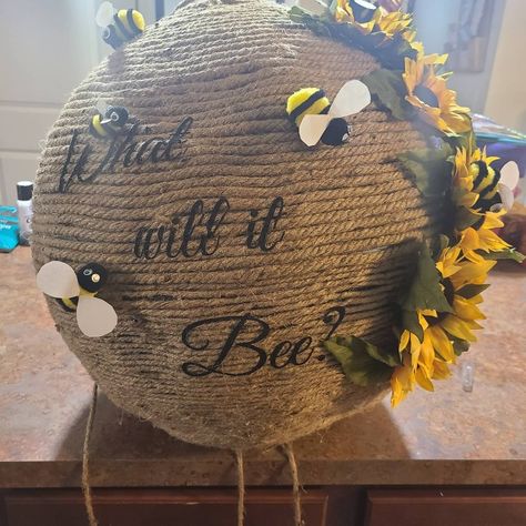 "What Will It Bee?" themed gender reveal beehive piñata handmade. Honey Bee Themed Gender Reveal, Diy Bee Hive Gender Reveal, What Could It Bee Gender Reveal, Bee Hive Gender Reveal Pinata, Honeycomb Gender Reveal, Bee Themed Gender Reveal Ideas, Bee Theme Gender Reveal Party Decorations, Bumble Bee Gender Reveal Party Ideas, What Will It Bee Gender Reveal Decor