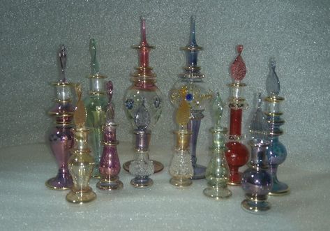 PRICES MAY VARY. Title: Lot of 12 Mix Mouth Blown Egyptian Perfume Bottles Pyrex Glass. Product Type: Categories > Home Décor Products > Home Décor Accents > Decorative Accessories > Decorative Bottles Egyptian Perfume, Egyptian Perfume Bottles, Handmade Perfume, Glass Perfume Bottles, Carnival Glass Bowls, Genie Bottle, Beautiful Perfume Bottle, Antique Perfume Bottles, Antique Perfume