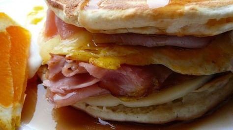 Ham, cheese, and a fried egg are sandwiched between two buttermilk pancakes and covered with syrup. A great way to use up leftover pancakes! Leftover Pancakes, Quick Breakfast Sandwich, Best Breakfast Sandwich, Stack Of Pancakes, Breakfast Sandwich Recipes, Pancake Breakfast, Breakfast And Brunch, Ham Cheese, What's For Breakfast