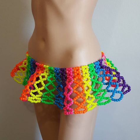 This kandi skirt is made with rainbow pony beads. This Item is made to order in your size. Want custom colors or a larger size send me a message or add a note with your order. Perfect for any event! You will get lots of compliments in this unique wearable art! Stand out at your next event! Edm festival Raves Party Rave outfit Festival outfit Mardi gras Kandi Skirt, Kandi Outfits, Skirt Rave Outfit, Festival Kandi, Rainbow Kandi, Kandi Rave, Rave Skirt, Rainbow Clothes, Rave Outfits Festivals