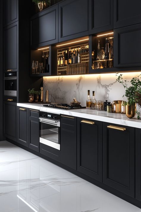 It is possible to create a black kitchen that is both stylish and inviting and these perfect examples will show you how! 2025 Kitchen Cabinet Trends, Classy Kitchen Decor, Black And Gold Kitchen Ideas, Black Interior House, Kitchen With Black Cabinets, Kitchen Examples, Organic Modern Bathroom, Black And Gold Kitchen, Kitchen Cabinet Trends