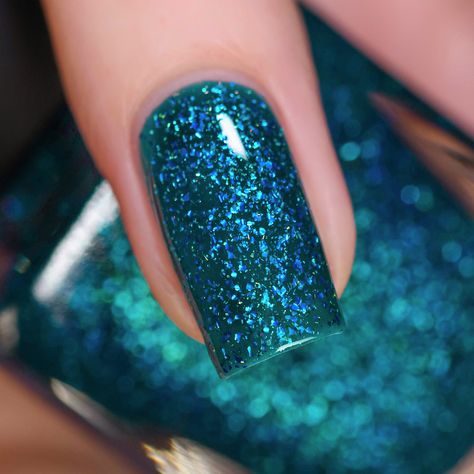 Good Mornings is a radiant teal holographic jelly nail polish. A lively teal jelly base, Good Mornings is loaded with an assortment of vivid blue metallic flakes. Look closely and you'll catch a glimpse of vibrant green sparkle alongside a touch of gleaming holographic micro-flakes! Inspired by the glimmering water flowing through a garden fountain, Good Mornings showcases an incredible finish full of radiance and depth! Good Mornings is part of the Courtyard Collection, a set of 6 beautifully r Teal With Glitter Nails, Dark Teal Metallic Nails, Teal And Sparkle Nails, Dark Teal Glitter Nails, Dark Blue Holographic Nails, Sparkly Teal Nails, Jelly Nail Polish, Ilnp Nail Polish, Jelly Nail