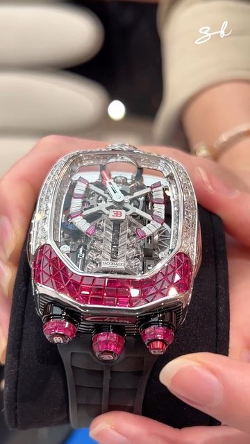 Misterdereloj on Instagram: "@supercarblondie checking out the marvelous @jacobandco Bugatti Chiron Tourbillon masterpiece with baguette diamonds and rubies 🔥 This unique concept features an incredible Bugatti16-cylinder engine animation in a timepiece, 30° inclined flying tourbillon, movement with 578 components that has been suspended in four placesand the stunning case shape inspired by the Bugatti Chiron Hypercar, including the horseshoe grill. Creativity and execution on another level." Jacob And Co Bugatti, W16 Engine, Jacob And Co, Heart Watch, Fancy Watches, Expensive Jewelry Luxury, Beauty Care Routine, Bugatti Chiron, Luxury Lifestyle Dreams