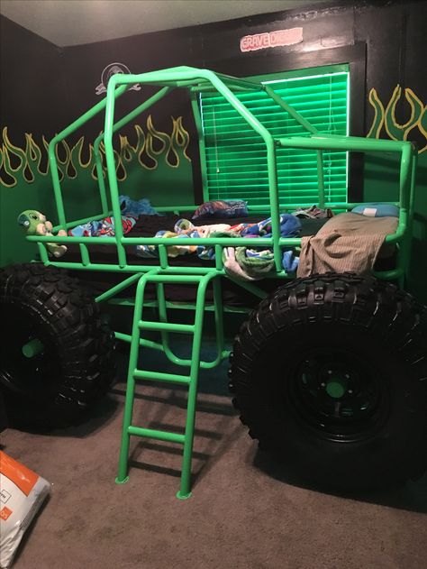 Truck Room For Boys, Monster Truck Display, Monster Truck Room Ideas, Monster Truck Storage Ideas, Monster Truck Bedroom Ideas, Monster Jam Room Ideas, Monster Jam Bedroom Ideas, Monster Jam Truck Storage, Monster Truck Play Area