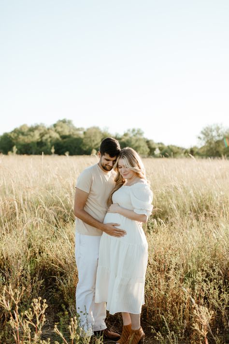 Maternity photo, white cream maternity dress, maternity photo in field, couples maternity photos, nature maternity photos, fall pregnancy photoshoot Cream Maternity Dress Photoshoot, Fall Maternity Outfits For Photoshoot Couples, Pregnancy Photos In Nature, Open Field Maternity Photos, Maternity Nature Photoshoot, Neutral Maternity Pictures, Pregnancy Photos Nature, Field Maternity Pictures, Cream Maternity Dress