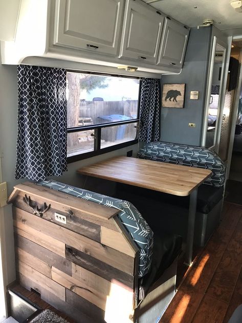 We’re getting so close to being completely done with our remodel!! My awesome hubby used some of our leftover butcher block to rebuild our dinette table and to make me a cover for the sink! W… Navy Rv Interior, Blue Rv Interior, Blue Camper Cabinets, Camper Dining Booth Remodel, Kombi Trailer, Motorhome Remodel, Camper Redo, Glamper Camper, Camper Reno