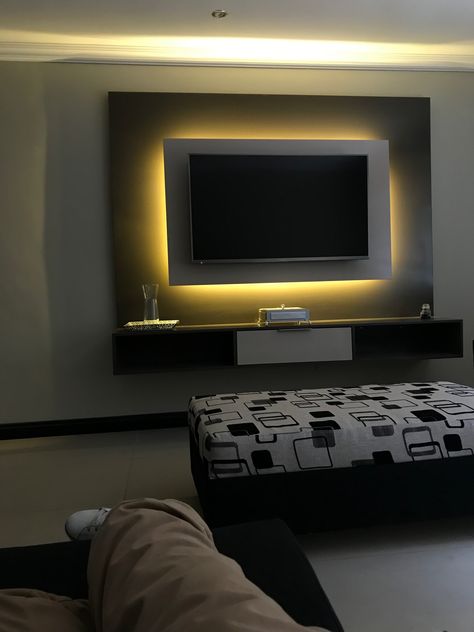 Floating TV wall unit with LED Backlight Led Lights Cabinets, Floating Tv Stand With Led Lights, Tv Led Lights Tv Walls, Tv Wall Design With Led Lights, Tv Counter Design, Led Media Wall, Tv Backlight Ideas, Tv Unit Lighting Ideas, Led Panel For Bedroom