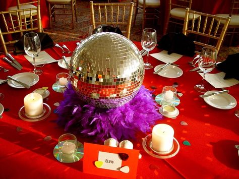 Disco Ball and feather boa. 1960s Party Centerpiece, Dancing Through The Decades Centerpieces, 70s Theme Table Centerpiece, 70s Party Table Decorations, 70s Themed Centerpieces, 70s Disco Party Decorations Table Centerpieces, Disco Themed Table Centerpieces, Disco Theme Table Decor, 70s Party Centerpieces