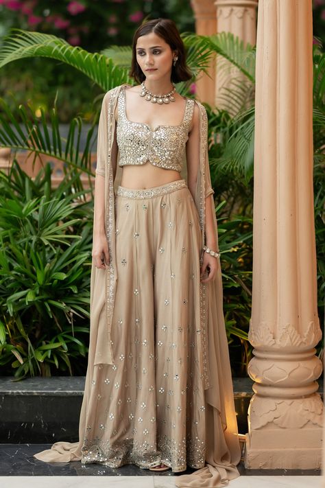 Buy Brown Semi Crepe Embroidered Mirror Notched Cape Palazzo Set For Women by Esha Koul Online at Aza Fashions. Sangeet Outfit Sisters, Palazzo Pants Outfit Indian, Palazzo Pants Outfit, Mehendi Outfit, Cape Set, Sangeet Outfit, Indian Bride Outfits, Vacuum Storage, Palazzo Set