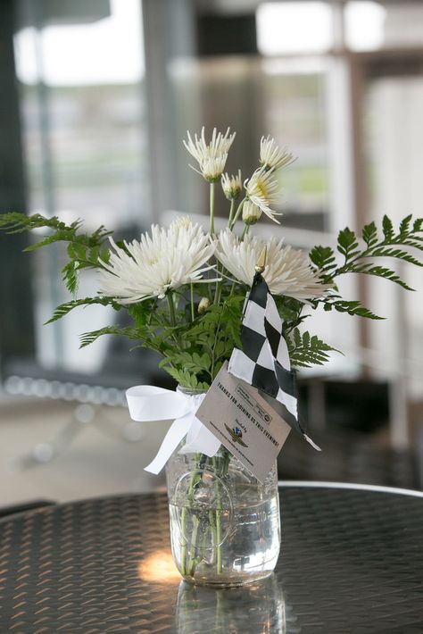 Race themed  centerpiece for cocktail table. Photo by Jennifer Driscoll. Race Car Wedding, Weeding Themes, Car Themed Wedding, Car Centerpieces, Race Wedding, Banquet Centerpieces, Car Wedding, Motos Vintage, Race Car Birthday Party