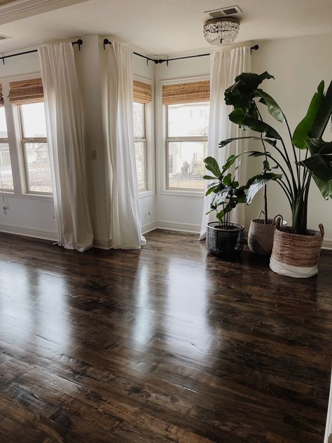 Adding Hardwood Floors in Primary Bedroom - Life Love Larson Bedroom Decor Hardwood Floors, Dark Wood Floors Modern, White Walls Dark Hardwood Floors, Pecan Wood Floors Living Room, White Furniture Dark Floors, Apartment Wood Floors, Living Room Rug Dark Wood, Bedrooms With Wooden Floors, Boho Living Room Dark Floors