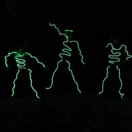 El wire costumes at SMCA's Haunted Hayride in the forest, in Dublin, Alabama. Glow Stick Costume, Blacklight Costume, Glowstick Costume, El Wire Costume, Halloween Hayride, Stick Costume, Glow Costume, Glow Dance, Light Up Costumes