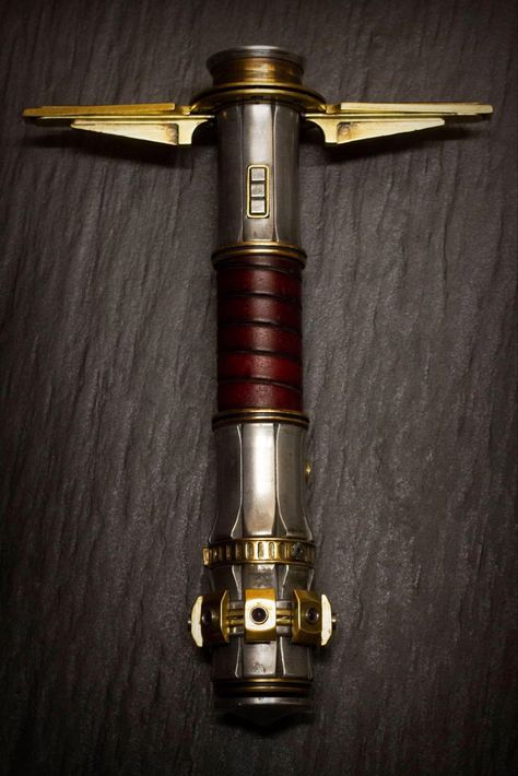 Hearts of kyber custom saber #thehighrepublic #saberlife #lightsaber #starwars Lightsaber Art Design, Crossguard Lightsaber Hilt, High Republic Lightsaber, Fantasy Lightsaber, Lightsaber Concept Design, Cross Guard Lightsaber, Lightsaber Concept Art, Lightsaber Hilt Design, Lightsaber Design Ideas